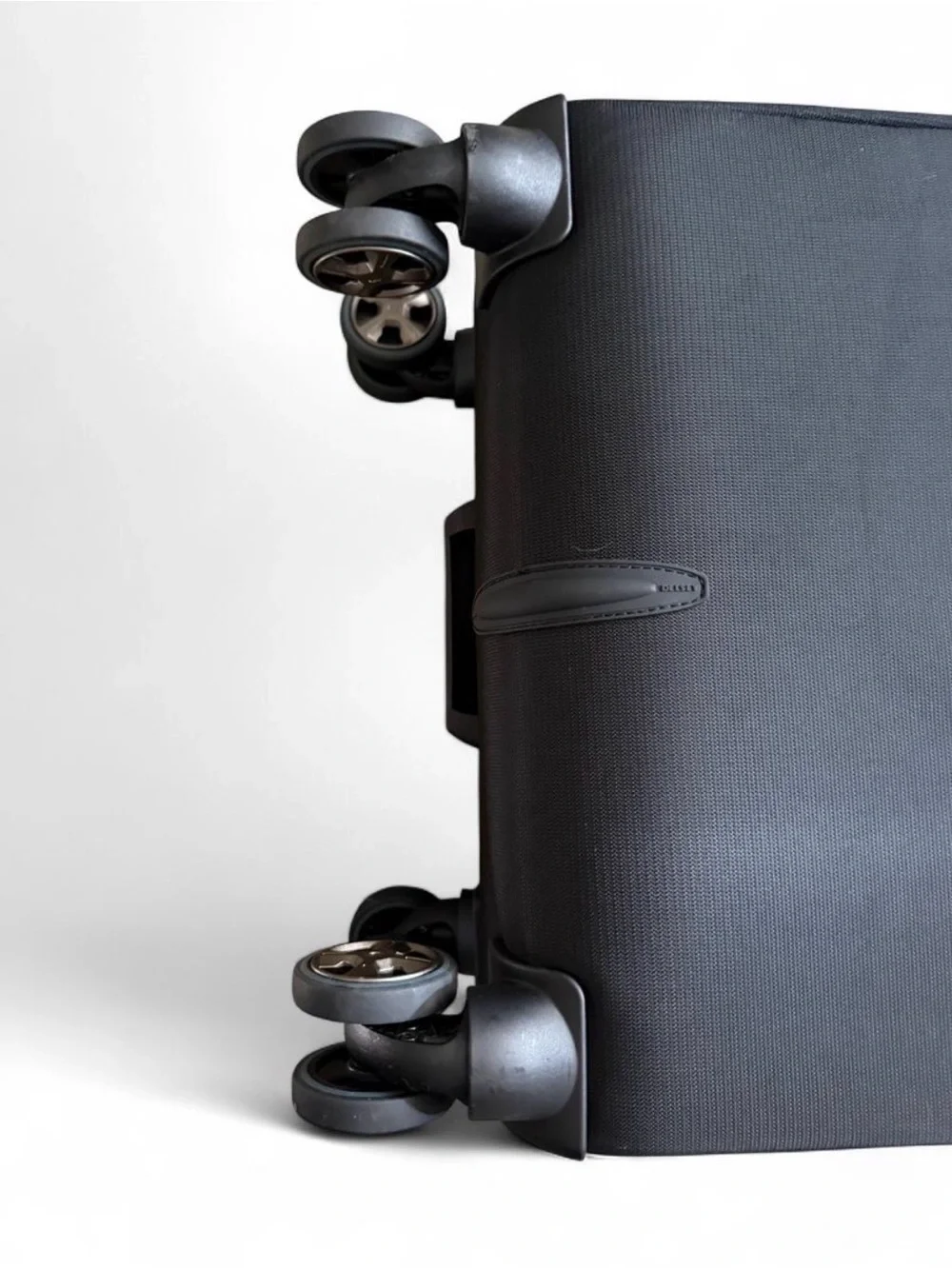 Delsey Paris Black soft-side Carry-On Spinner luggage 22”